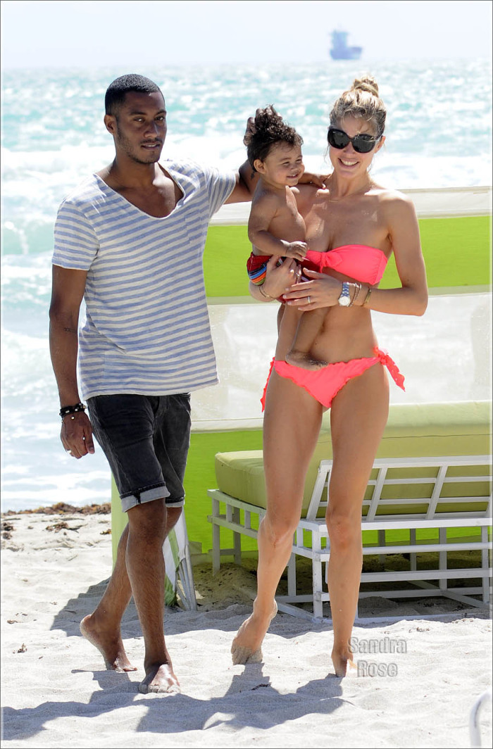 Doutzen Kroes Is Seen On The Beach With Her Husband and Son