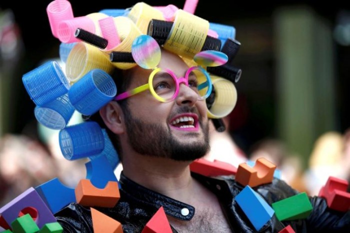 A participant takes part in the annual Pride London Parade which highlights issues of the gay, lesbian and transgender community, in London, Britain June 25, 2016. REUTERS/Peter Nicholls/Files