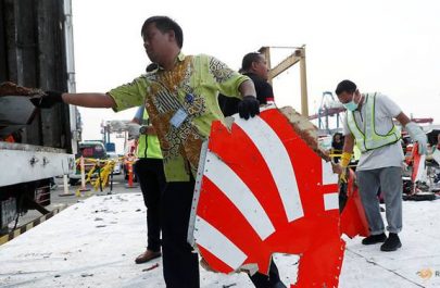 file-photo--workers-load-up-recovered-debris-and-belongings-believed-to-be-from-lion-air-flight-jt610-onto-a-truck-at-tanjung-priok-port-in-jakarta-1
